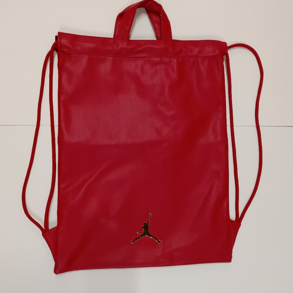 JORDAN Red Faux Leather Drawstring Backpack with Gold Jumpman